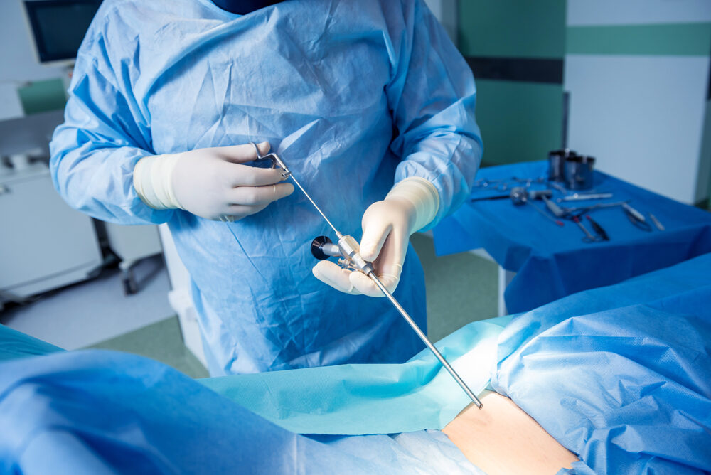 Surgeon,Performs,Endoscopic,Microdiscectomy,Of,Herniated,Intervertebral,Disc.